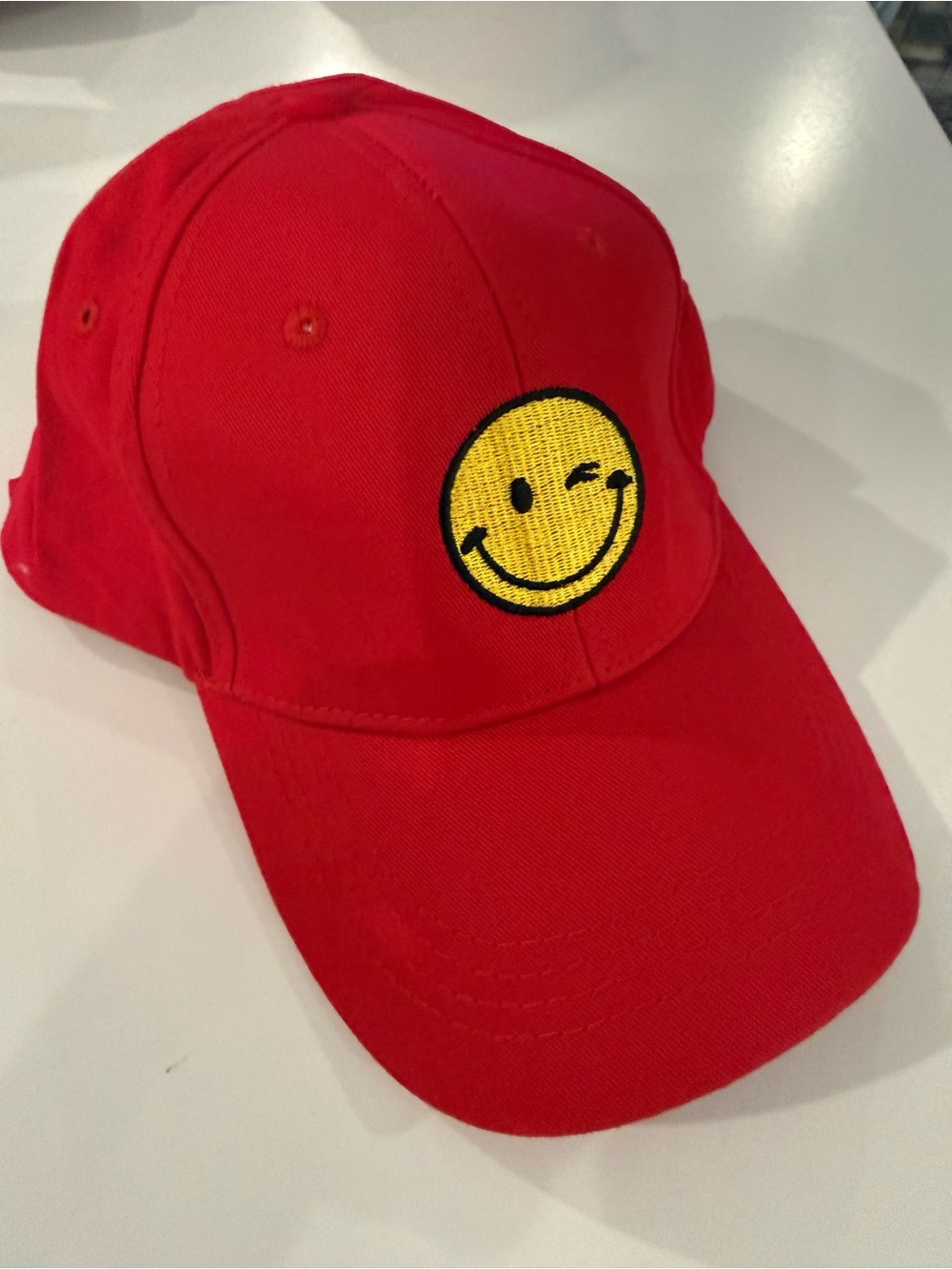 Kids Red Baseball Cap with Winking Smiley Patch